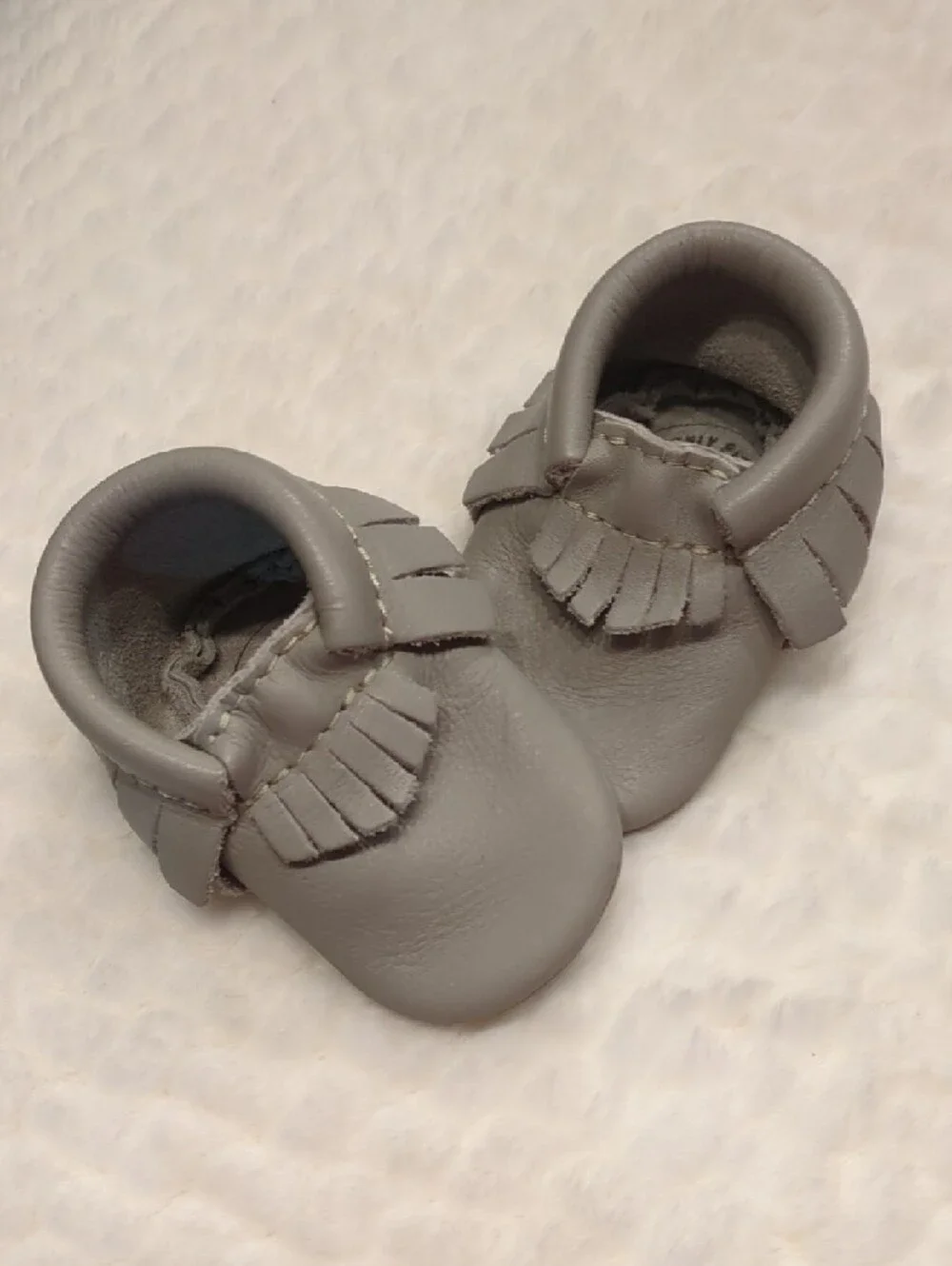 Freshly Picked Light Gray Fringe Baby Moccasins